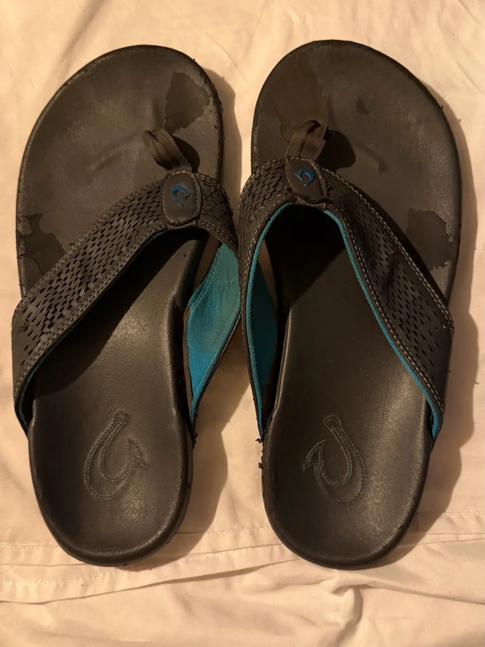 OluKai Men's Black Flip-Flops with Teal Accents